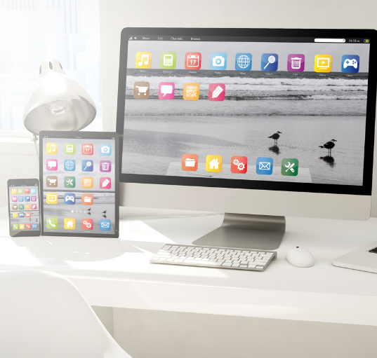 Image of desktop computer, tablet, and mobile device.