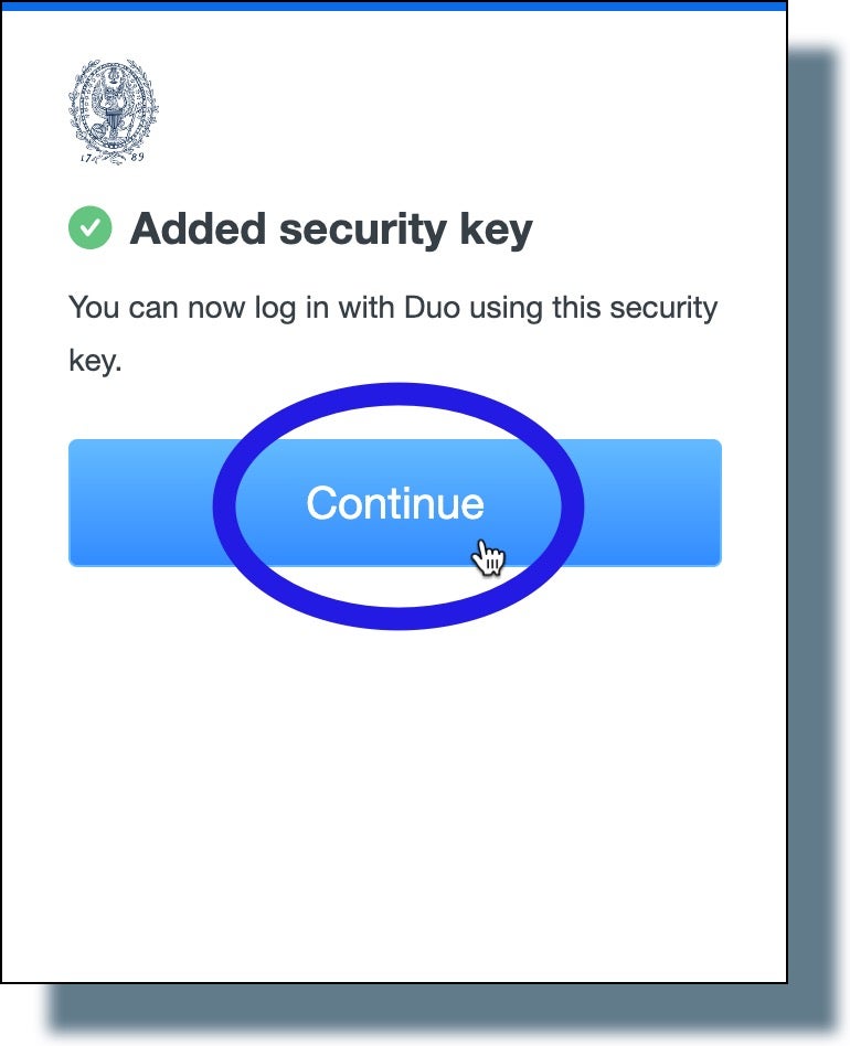Image of confirmation that your security key was added. Click 'Continue'.